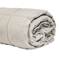 Edredon enrollado de lino lavado beige